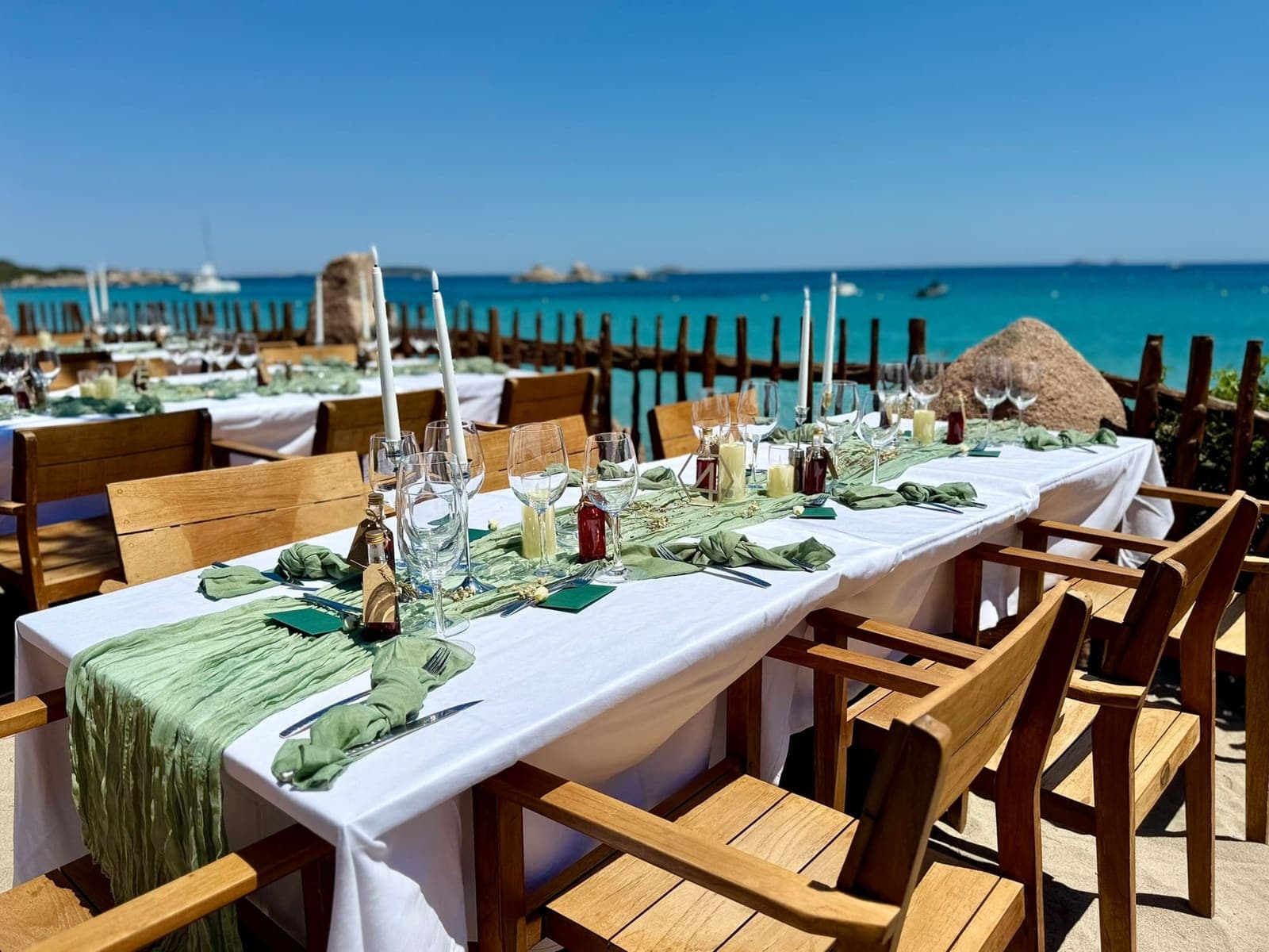 Event table set facing the sea at Palombaggia, at Le Petit Chose