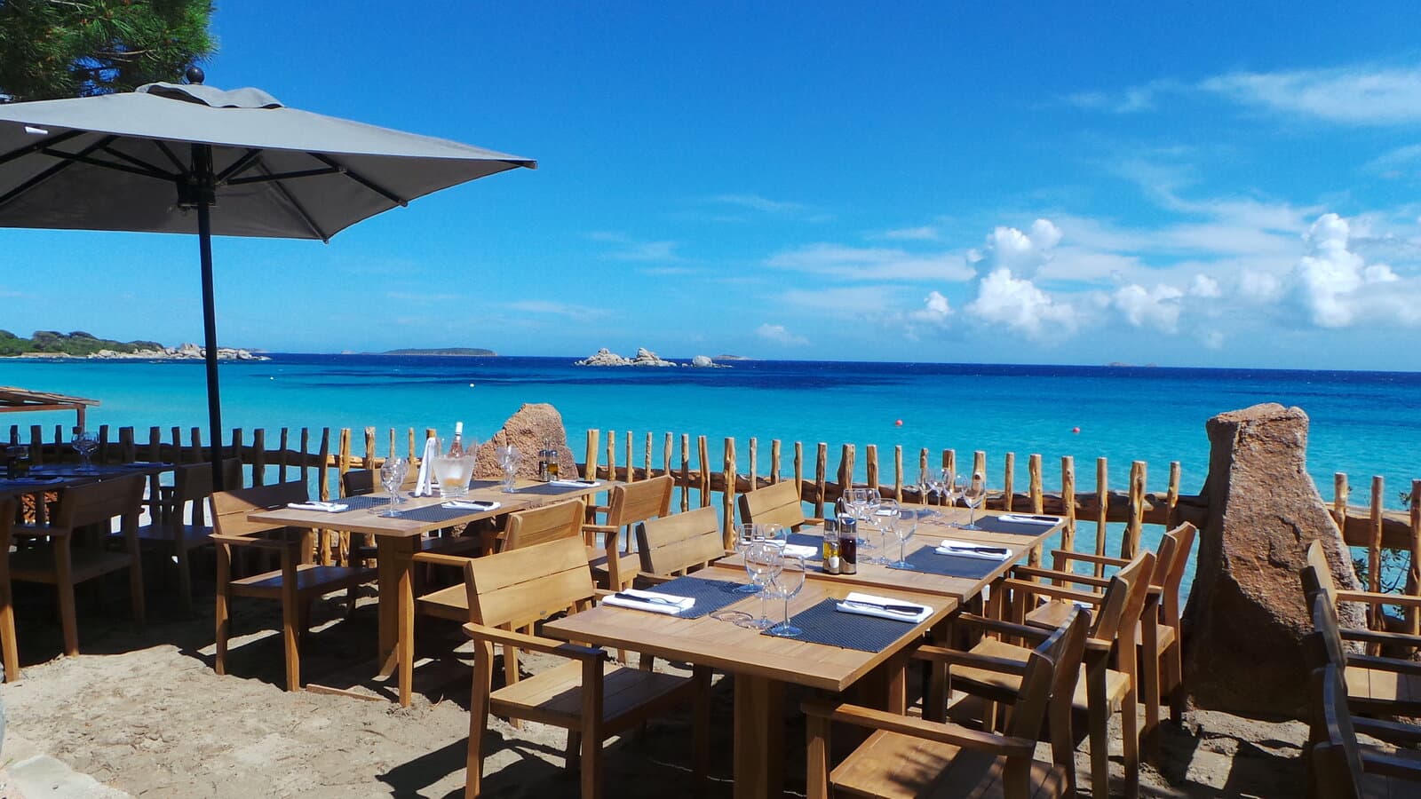 Le Petit Chose restaurant, toes in the sand at Palombaggia